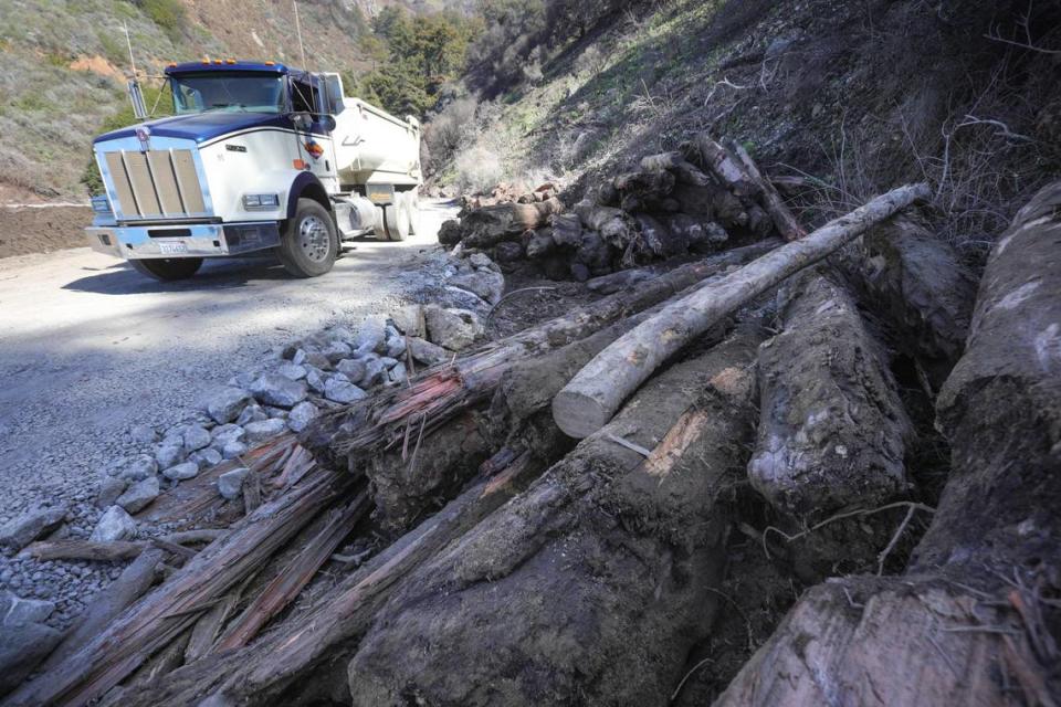 Highway 1 washed out at Rat Creek about 30 miles north of the Monterey, San Luis Obispo county line. Debris included charred trees from the Dolan fire, washed downstream by an atmospheric river rainfall.