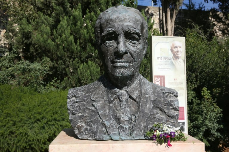 A bronze chest statue of late Israeli ex-president and Nobel Peace Prize winner Shimon Peres, whose death on September 28, 2016 has caused an outpour of grief, sits in the gardens of the President's Residence in Jerusalem