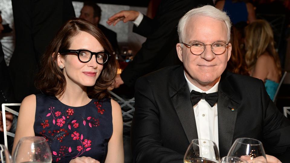 Anne Stringfield and Steve Martin sitting at a table together