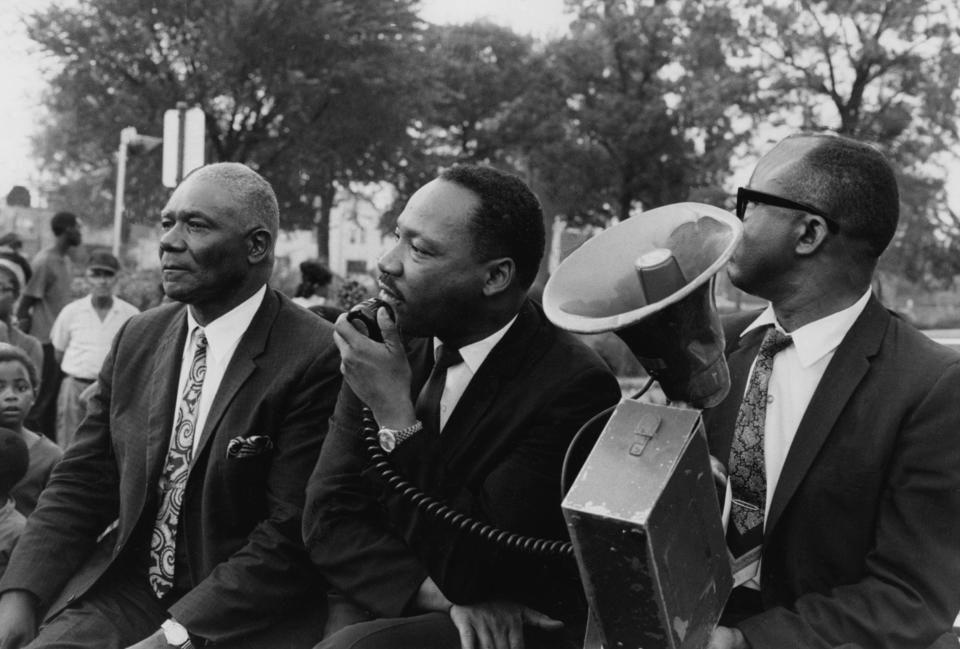 Martin Luther King Jr. waits in August 1967 to speak to housing protesters in Louisville?s South End.Aug. 20, 1967