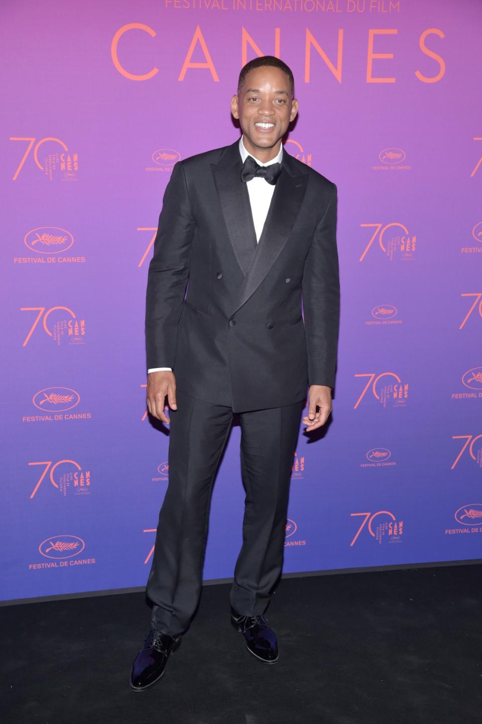 <p>Will was dapper as always in a traditional black tuxedo.<br><i>[Photo: Getty]</i> </p>