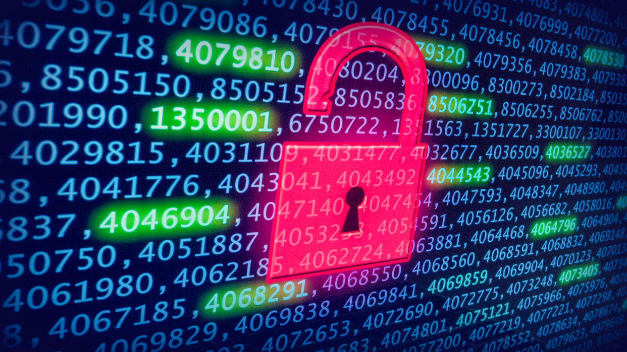  Red padlock over screen of numbers signifying cybersecurity 