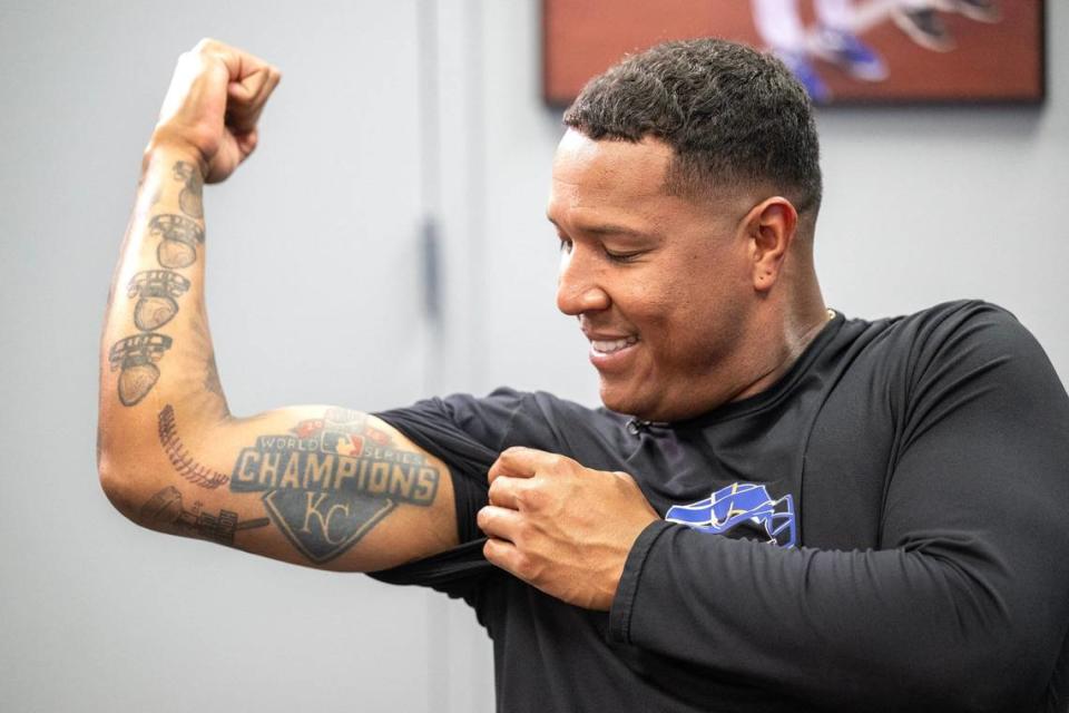 Asked if he had any tattoos representing Kansas City, Royals catcher Salvador Perez flexed the one on his bicep memorializing the 2015 World Series won by the Royals with Perez as the series MVP.