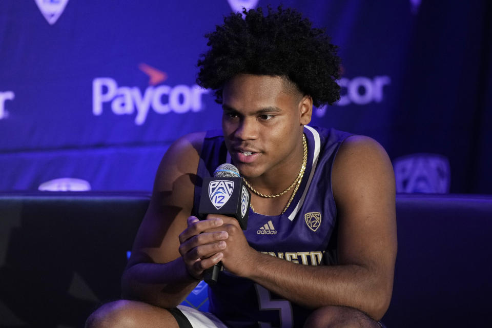 FILE - Washington's Sahvir Wheeler speaks during a news conference at the Pac-12 Conference NCAA college basketball media day Oct. 11, 2023, in Las Vegas. Wheeler transferred to Washington after spending the past two seasons at Kentucky. He’s expected to step into a major role for the Huskies. (AP Photo/John Locher, File)