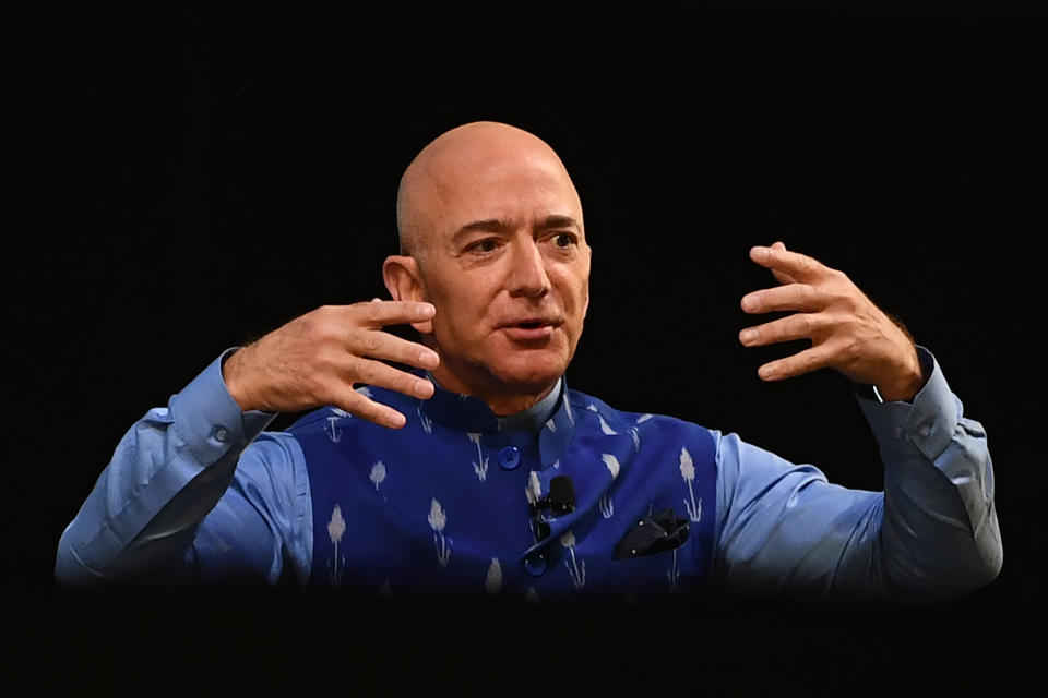 CEO of Amazon Jeff Bezos (R) gestures as he addresses the Amazon's annual Smbhav event in New Delhi on January 15, 2020. - Bezos, whose worth has been estimated at more than $110 billion, is officially in India for a meeting of business leaders in New Delhi. (Photo by Sajjad  HUSSAIN / AFP) (Photo by SAJJAD  HUSSAIN/AFP via Getty Images)