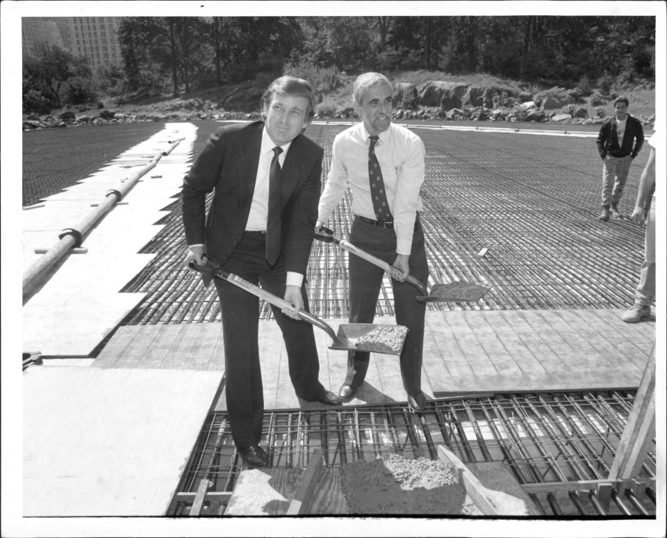 Donald Trump and Henry Stern lay the first cement at Wollman Rink in New York City's Central Park on Sept. 10, 1986.