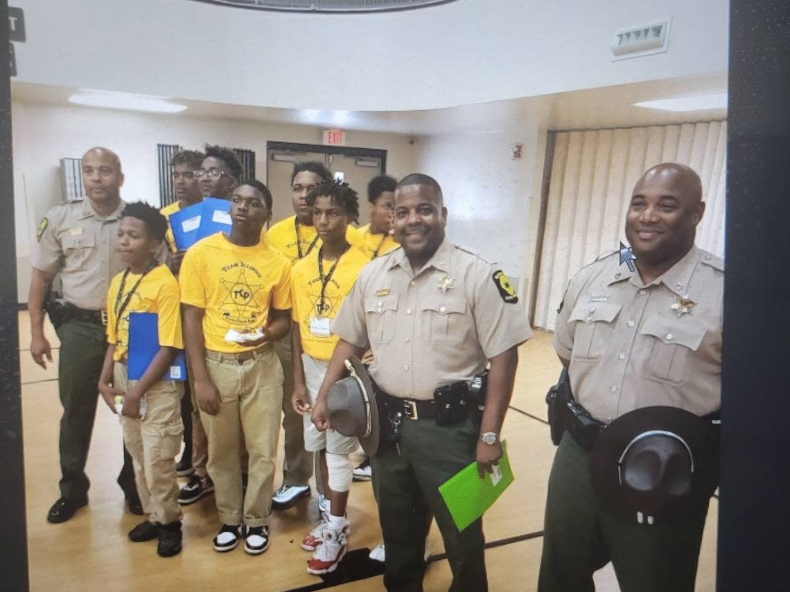 Officers and with cadets following the graduation ceremony at the Team Illinois Youth Police Camp. This year’s camp will take place Sunday, July 16, through Saturday, July 22, at Principia College in Elsah, Illinois.