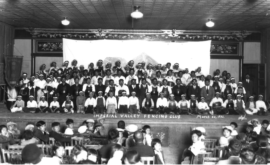 A group portrait of Japanese members of the Imperial Valley Fencing Club in 1932.