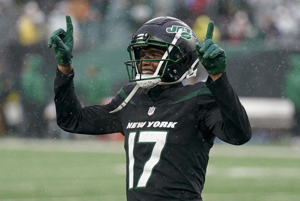 New York Jets wide receiver Garrett Wilson (17) reacts after scoring a touchdown against the Chicago Bears during the second quarter of an NFL football game, Sunday, Nov. 27, 2022, in East Rutherford, N.J. (AP Photo/Seth Wenig)