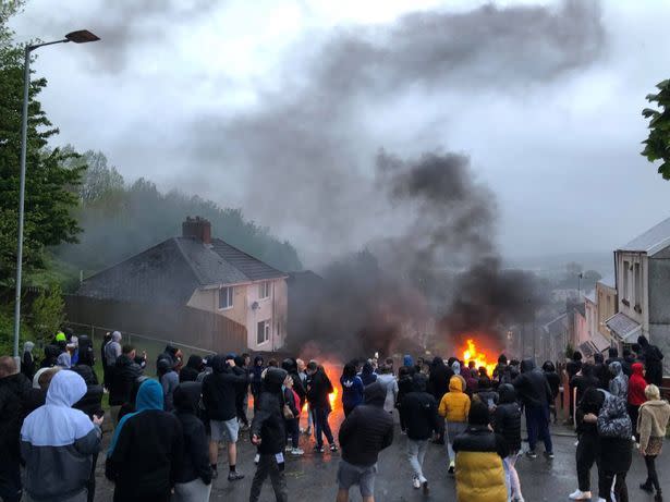 Shocking images showed cars set alight by a mob in the Mayhill area of Swansea. (Wales News)