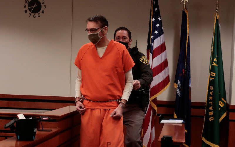 James Crumbley, the father of accused Oxford High School gunman Ethan Crumbley, enters the court room during a court procedural hearing