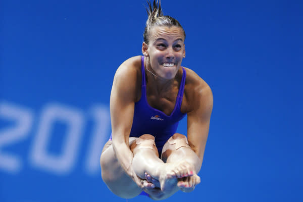 Italy's Tania Cagnotto performs a dive during the women's 3m springboard preliminary round at the London 2012 Olympic Games at the Aquatics Centre August 3, 2012. OLY-DIVE-DVW3SP/(DVW001901) REUTERS/Jorge Silva (BRITAIN - Tags: OLYMPICS SPORT DIVING) 