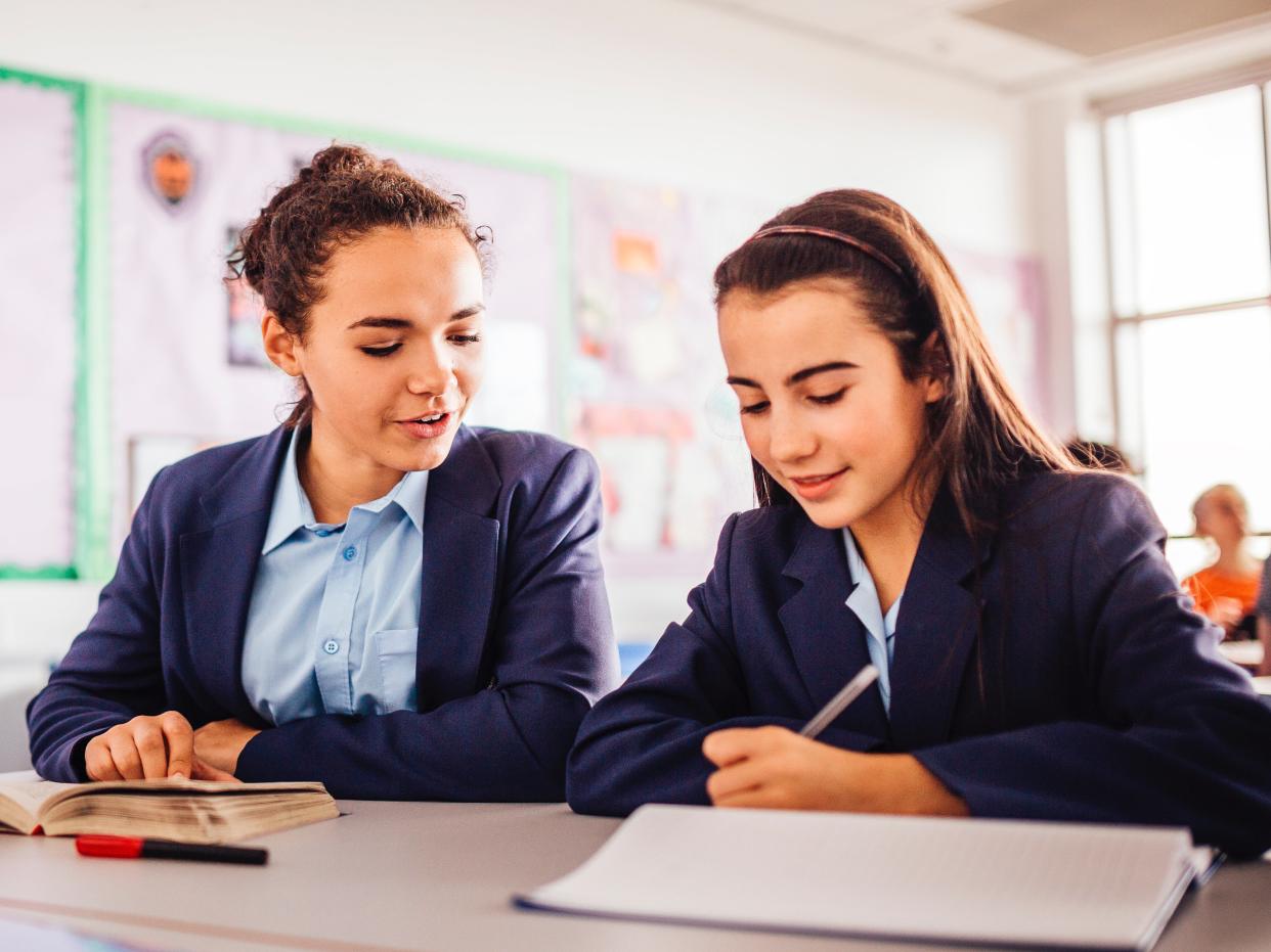 <p>Researchers found wellbeing and confidence levels are similar in boys and girls at the end of primary school and both decline, but girls suffer a larger plummet by they reach the age of 14</p> (Getty Images)
