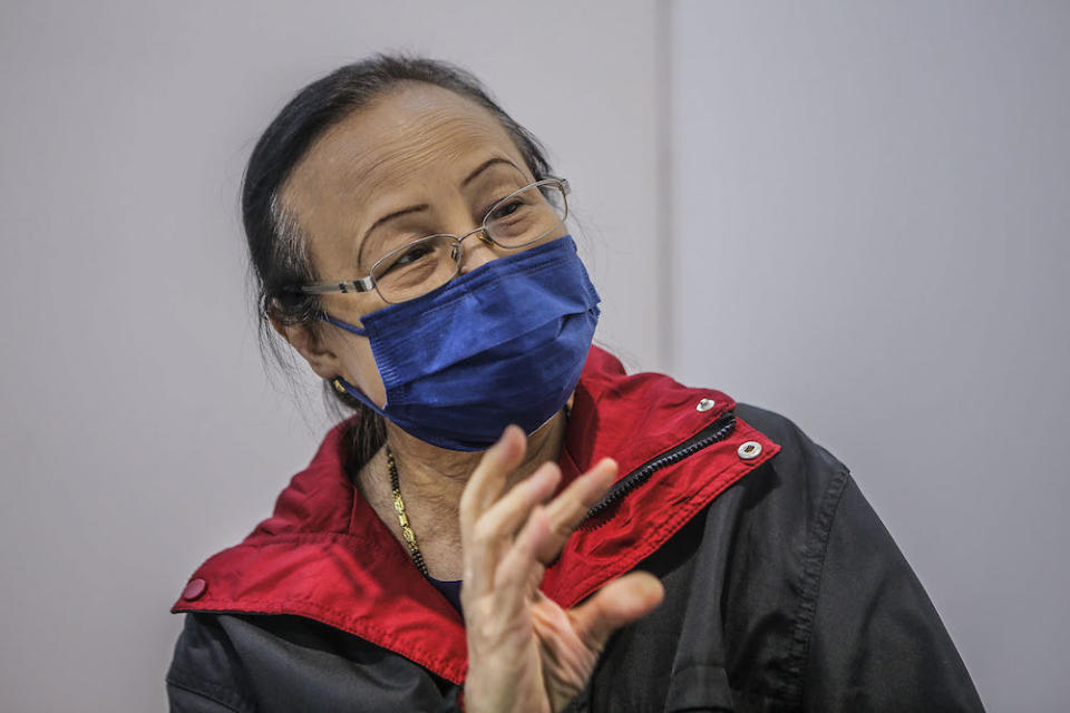 Volunteer Ong Hoon Luan speaks to Malay Mail at the vaccination centre (PPV) in Bukit Jalil June 27, 2021. ―  Picture by Hari Anggara