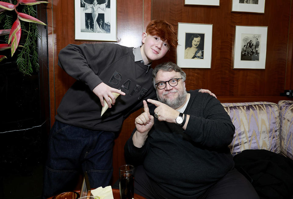 (L-R) Gregory Mann and Guillermo del Toro attend the Netflix Oscar Nominee Celebration at Sunset Tower Hotel on March 11, 2023 in Los Angeles, California.