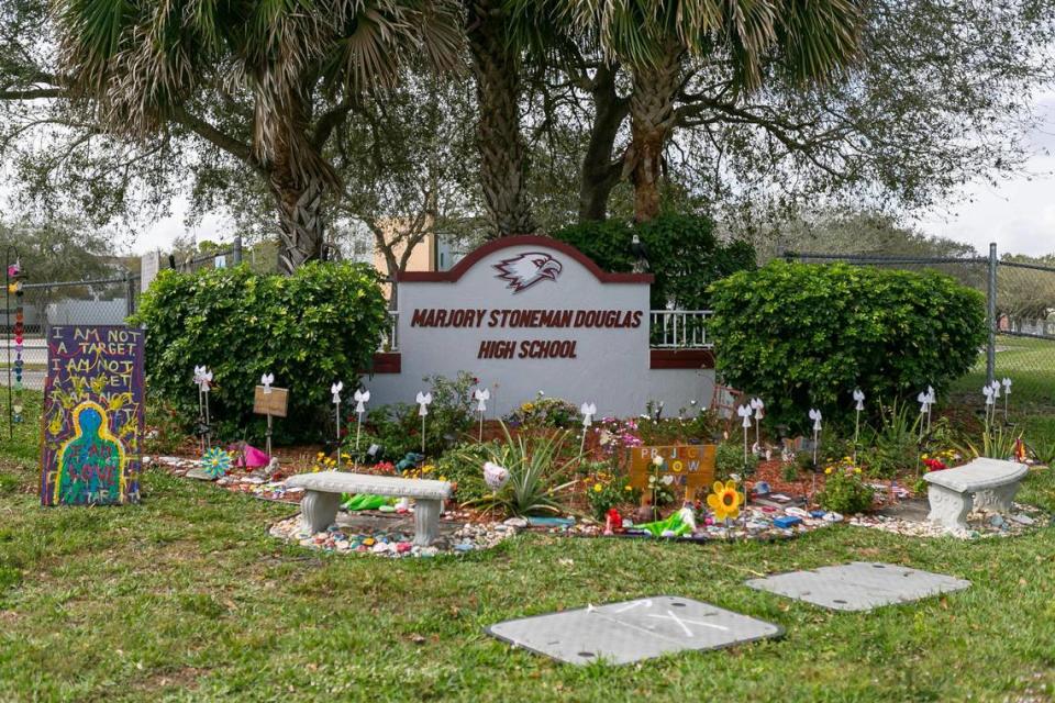 A memorial sits near Marjory Stoneman Douglas High School in Parkland, Florida, on Feb. 13, 2021. Three years earlier, on Feb. 14, 2018, a gunman entered the school and killed 14 students and three staff members.