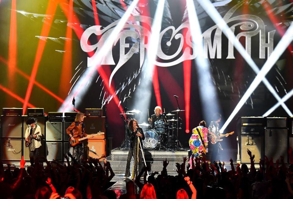 NEW YORK, NY - AUGUST 20:  Aerosmith and Post Malone (R) perform onstage during the 2018 MTV Video Music Awards at Radio City Music Hall on August 20, 2018 in New York City.  (Photo by Michael Loccisano/Getty Images for MTV)