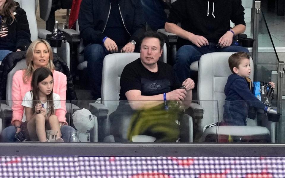 Elon Musk watches action during the first half of the NFL Super Bowl 58 football game