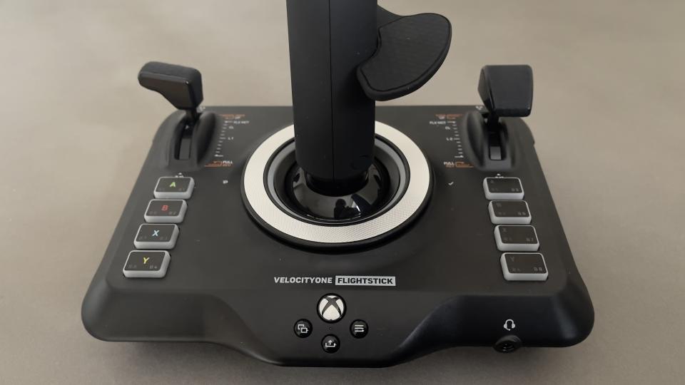 The Turtle Beach VelocityOne flightstick resting on a light surface