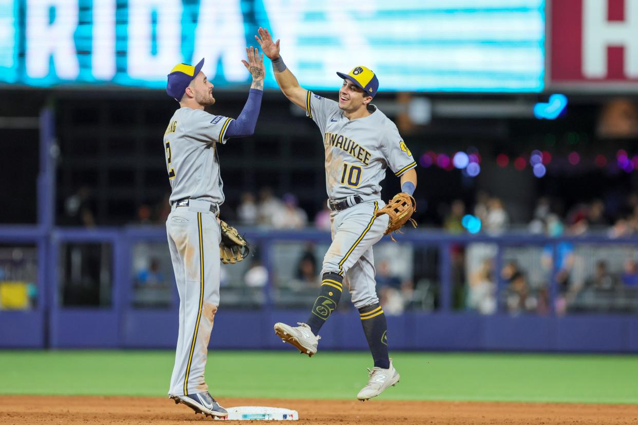 Milwaukee Brewers outfielder Sal Frelick (10) celebrates with second baseman Brice Turang (2) after winning the game against the Miami Marlins at loanDepot Park.