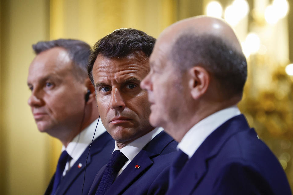 Polish President Andrzej Duda, left, French President Emmanuel Macron, center, and German Chancellor Olaf Scholz attend a joint press conference Monday, June 12, 2023 at the Elysee palace in Paris. Emmanuel Macron, German Chancellor Olaf Scholz and Polish President Andrzej Duda meet in Paris for talks focusing on military support for Ukraine's counteroffensive and future security guarantees to be given to the country, ahead of a NATO summit in July. (Sarah Meyssonnier, Pool via AP)