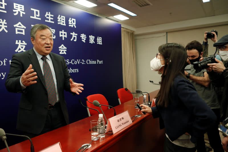 Liang Wannian at a news conference on the WHO-China joint study, in Beijing