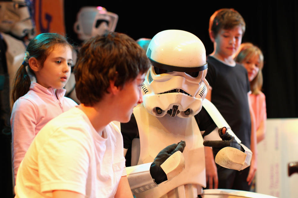 SYDNEY, AUSTRALIA - APRIL 11: Jacob French talks to patients after completing his trek at the Sydney Children's Hostpital on April 4, 2012 in Sydney, Australia. French today completed the over 5,000 km trek from Perth to Sydney on foot, donning a full body stormtrooper costume he successfully raised over $100,000 for the Starlight Children's Foundation. Since July 2011, Jacob has walked 10 hours a day, Monday to Friday, lost over 12kg in weight, and gone through seven pairs of shoes. The Starlight Children's Foundation provides programs to help lift the spirits of sick children in hospitals accross Australia. (Photo by Cameron Spencer/Getty Images)