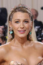 <p> Blake Lively has been on many a Met Gala red carpet in her time, but this soft sparkly look is one of our favourites. It’s a winning look because of the way the shimmery tones used in her makeup pair perfectly with her accessories. </p>