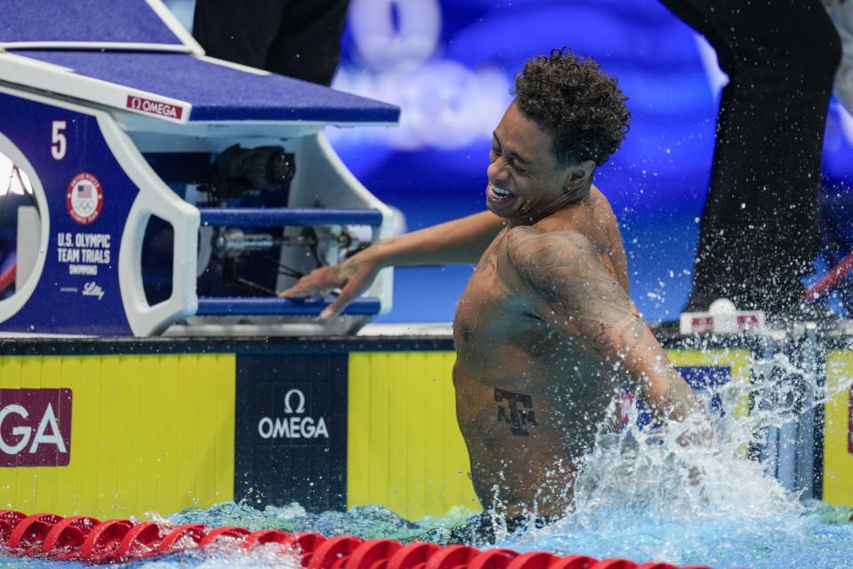 Shaine Casas celebrates after the Men's 200 individual medley finals Friday, June 21, 2024, at the US Swimming Olympic Trials in Indianapolis. (AP Photo/Michael Conroy)