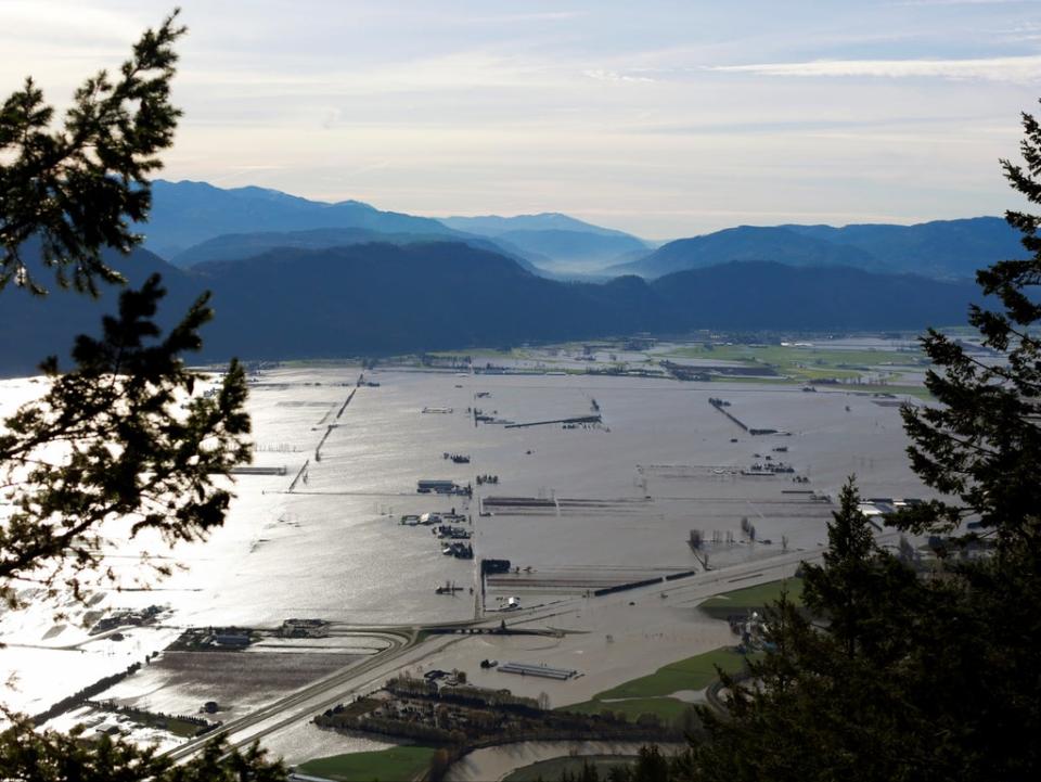 Flooded houses and farms are seen from the top of Sumas Mountain (REUTERS)