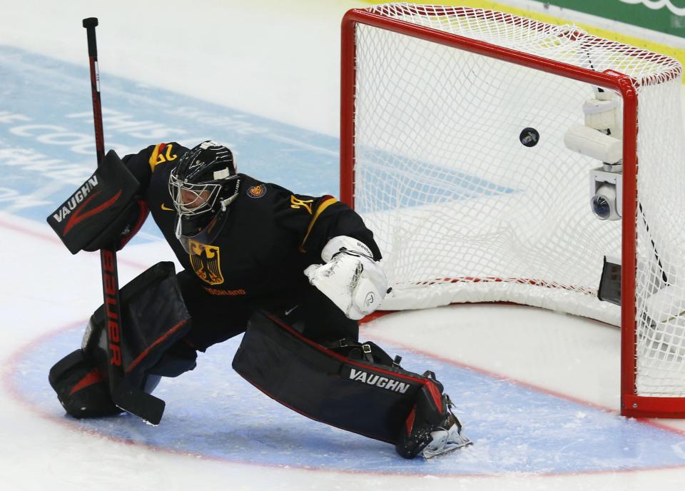 Germany's goalie Anthony Stolarz lets the puck into his net during the second period of the IIHF World Junior Championship ice hockey game against the U.S. team in Malmo, Sweden, December 29, 2013. REUTERS/Alexander Demianchuk (SWEDEN - Tags: SPORT ICE HOCKEY)