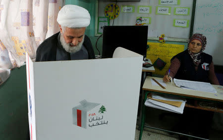 Lebanon's Hezbollah deputy leader Sheikh Naim Qassem votes at a polling station during the parliamentary election, in Beirut, Lebanon, May 6, 2018. REUTERS/Mohamed Azakir