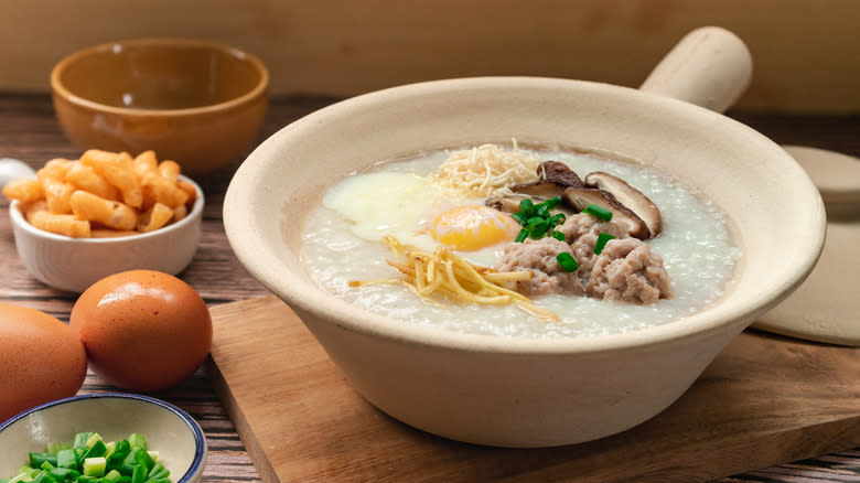 Rice porridge with eggs, mushrooms, ginger