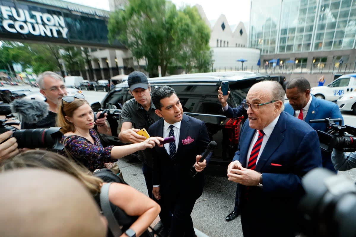 Rudy Giuliani arrives at the Fulton County Courthouse on Wednesday, Aug. 17, 2022, in Atlanta.  Giuliani is scheduled to testify before a special grand jury that is investigating attempts by former President Donald Trump and others to overturn his 2020 election defeat in Georgia. (AP Photo/John Bazemore) (AP)