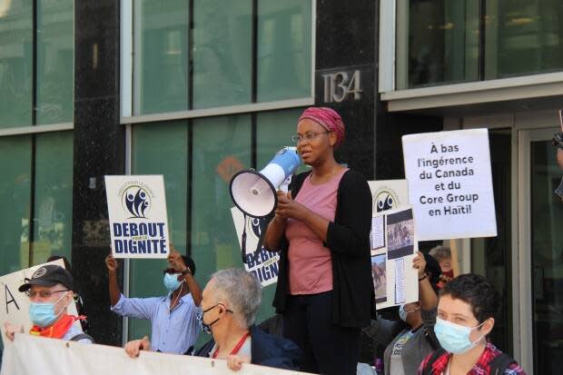 Jenni-Laure Sully was among those who gathered on Saturday in front of the U.S. Consulate in downtown Montreal. (Rowan Kennedy/CBC - image credit)