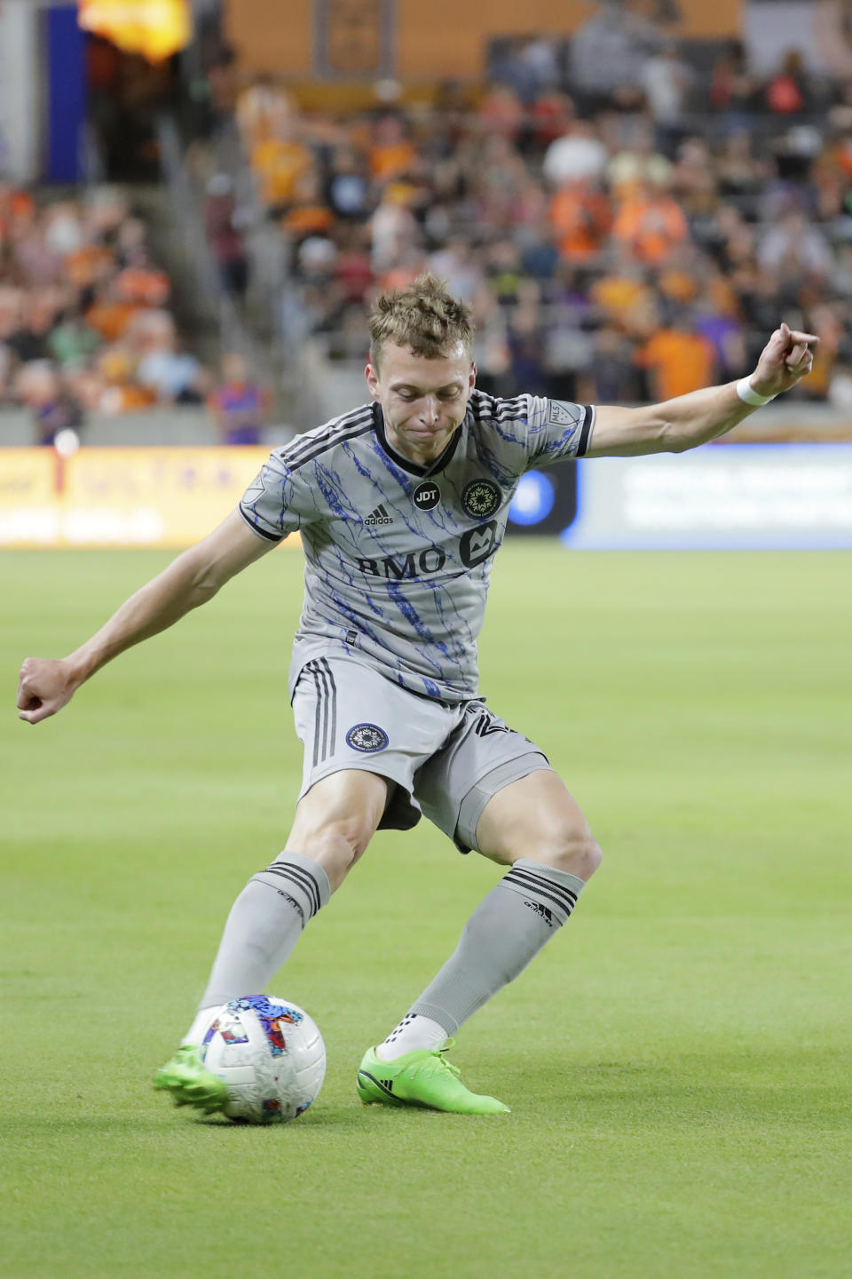 CF Montreal defender Alistair Johnston attempts a shot on goal against the Houston Dynamo during the first half of an MLS soccer match Saturday, Aug. 13, 2022, in Houston. (AP Photo/Michael Wyke)