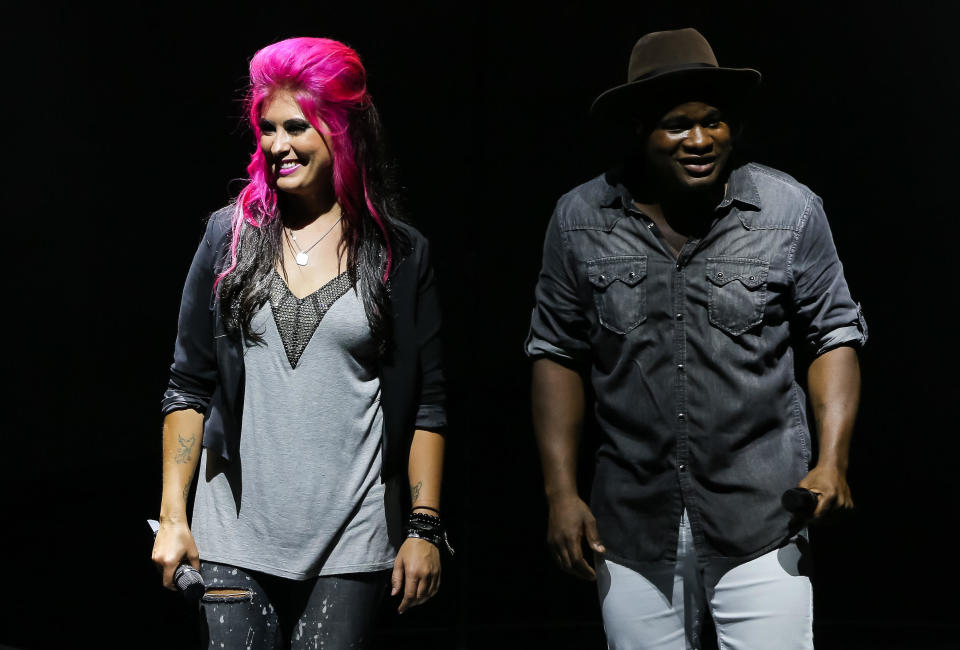 Contestants Jessica Meuse (L) and C.J. Harris perform at American Idol Live! at The Greek Theatre on August 14, 2014 in Los Angeles, California. / Credit: Chelsea Lauren/WireImage/Getty Images