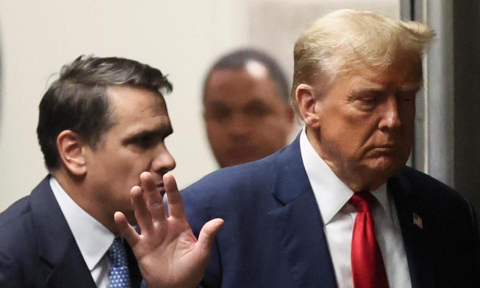 <span>Donald Trump with his lawyer Todd Blanche outside court on Tuesday.</span><span>Photograph: Brendan McDermid/AP</span>