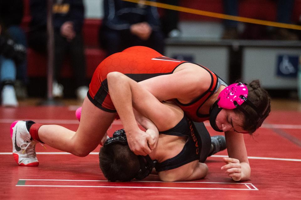 Port Jervis' Charlie Wylie, top, wrestles Marlboro's Lorenzo Caserto, bottom, in the 102-pound weight class during the Section 9 Division 2 finals at Liberty High School on Sunday, February 13, 2022.