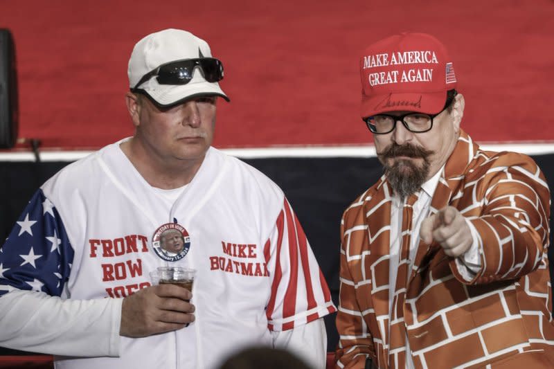 Supporters wait for former President Donald Trump to arrive to celebrates his win in the 2024 Iowa Caucus at the Iowa Events Center in Des Moines on Monday Photo by Tannen Maury/UPI