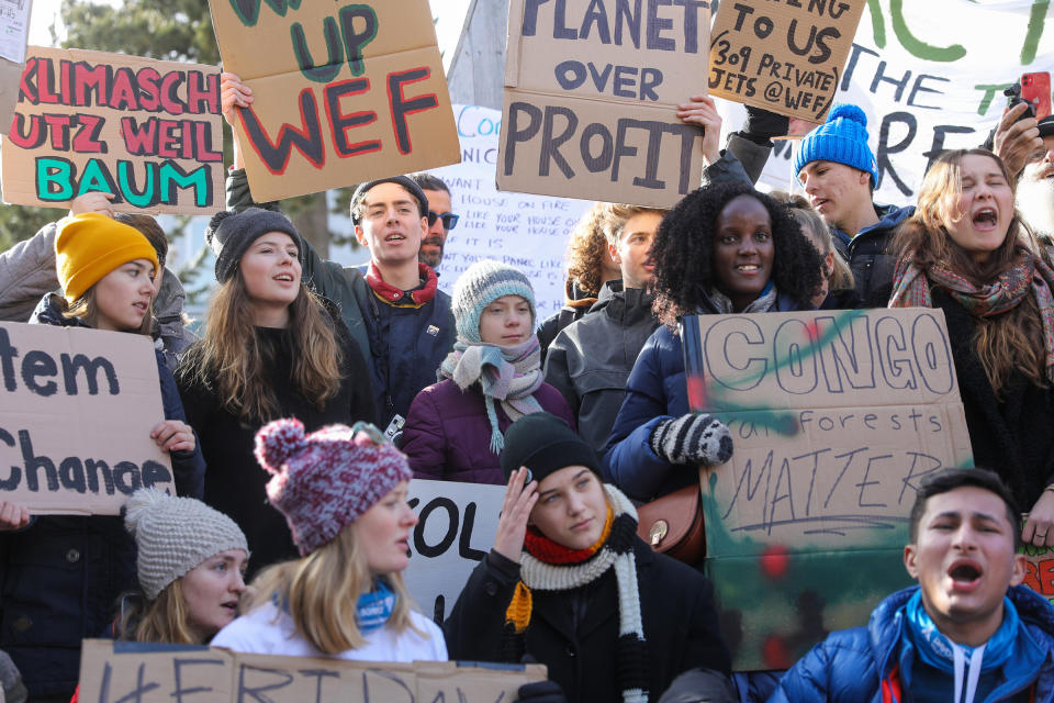 Nakate and other climate activists, including Greta Thunberg, Isabelle Axelsson and Luisa Neubauer, demonstrate during the World Economic Forum in Davos, Switzerland on Jan. 24, 2020.<span class="copyright">Simon Dawson—Bloomberg/Getty Images</span>