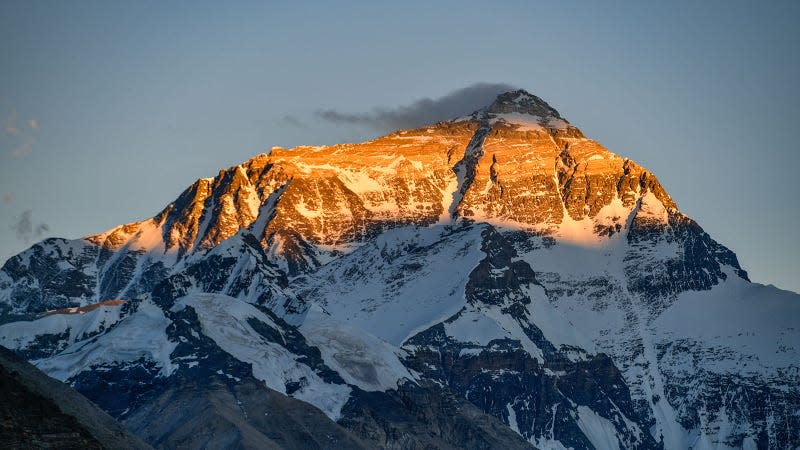 A photo of Mount Everest at sunset. 