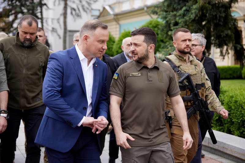 Poland's President Duda and Ukraine's President Zelenskiy arrive a meeting in Kyiv