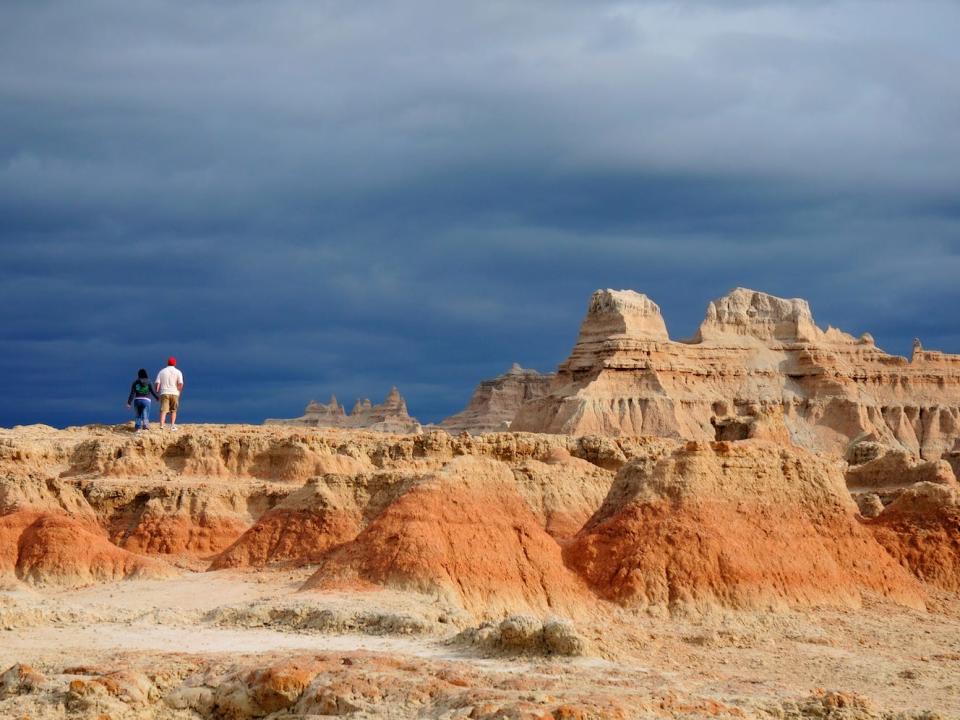 Couple Walking Badlands South Dakota