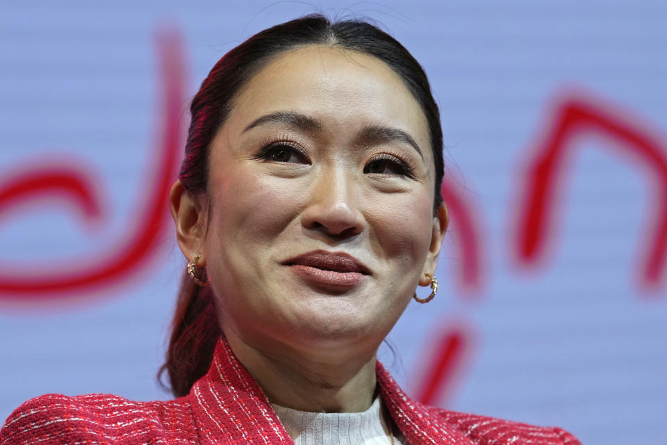 Paetongtarn Shinawatra, a leader of Thailand's opposition Pheu Thai Party, smiles as she talks to reporters at Thammasat University’s indoor gymnasium in Pathum Thani province, north of Bangkok, Thailand, on Friday, March 17, 2023. The Pheu Thai Party is heavily favored to win the most seats in the May 14 general election, and Paetongtarn, daughter of former Prime Minister Thaksin Shinawatra, is one of its three nominees to become the next prime minister. (AP Photo/Sakchai Lalit)