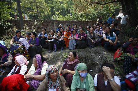 Relatives observe the cremation ceremony of Nepali Sherpa climbers, who lost their lives during an avalanche at Mount Everest last Friday, in Kathmandu April 21, 2014. REUTERS/Navesh Chitrakar