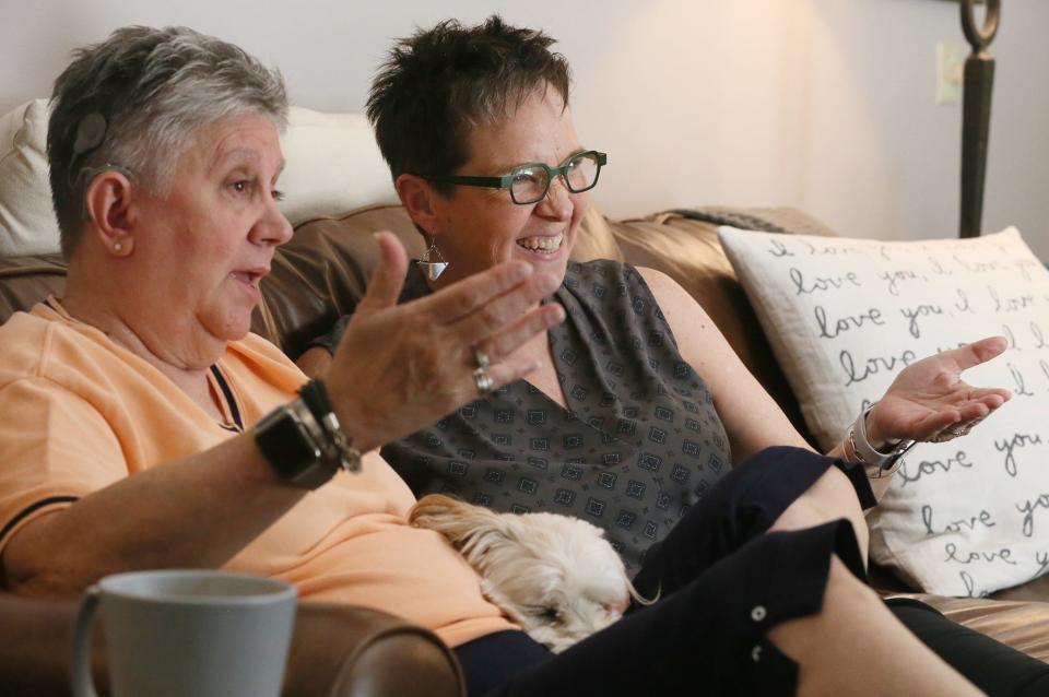 Ellen and Wendy McWilliams-Woods gesture as they talk about their lives, careers and family at their home in Kent.