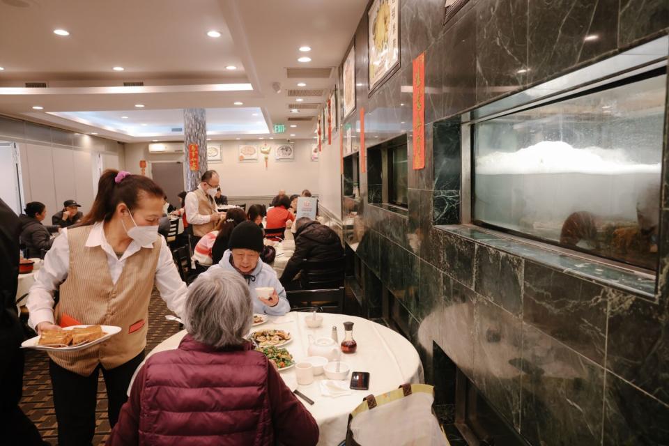 Customers eat lunch at Taste of MP in Monterey Park on Tuesday.