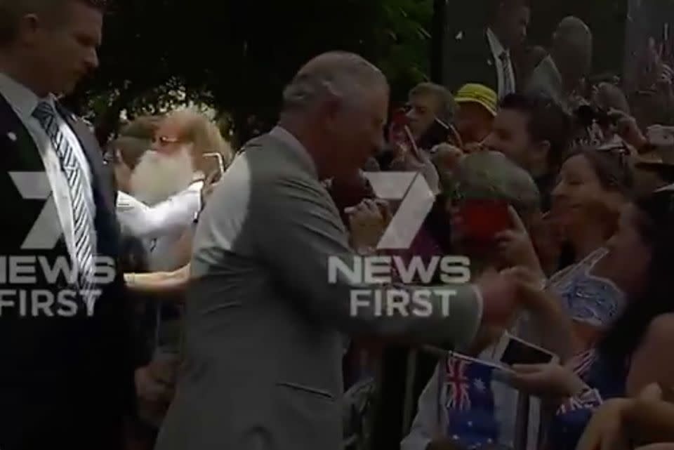 The man appears to be in a tussle with security. Source: 7 News