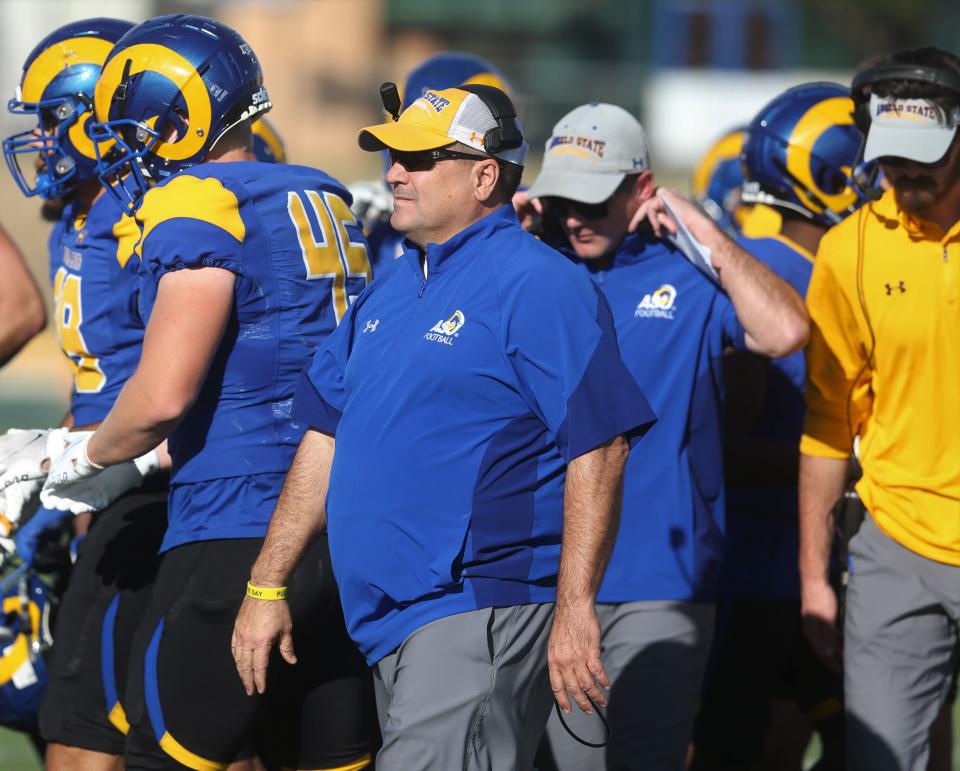 Angelo State University head football coach Jeff Girsch walks back to the sidelines after a timeout during an NCAA Division II first-round playoff game against Minnesota-Duluth at LeGrand Stadium at 1st Community Credit Union Field on Saturday, Nov. 20, 2021.